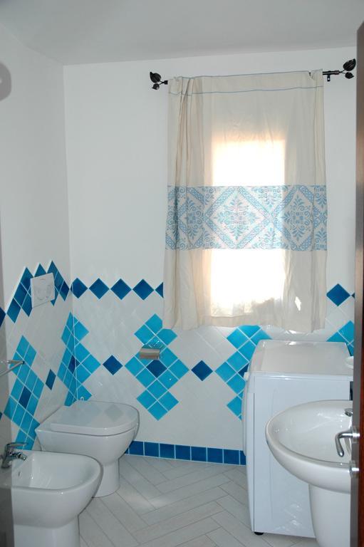 Holiday Homes Stella Marina Сан-Теодоро Номер фото